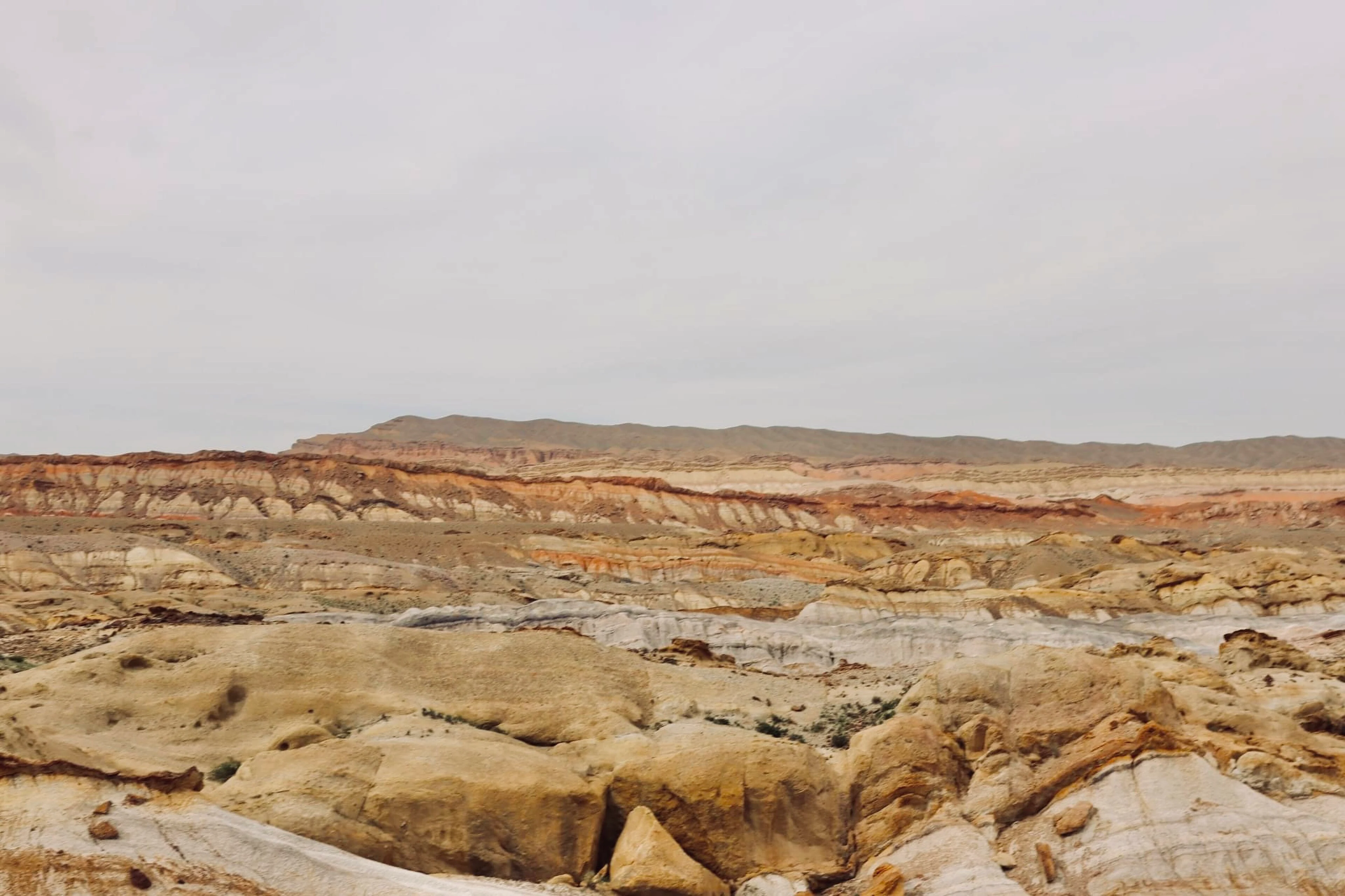 Layered rock formations at Madygen State Natural Monument in Batken.