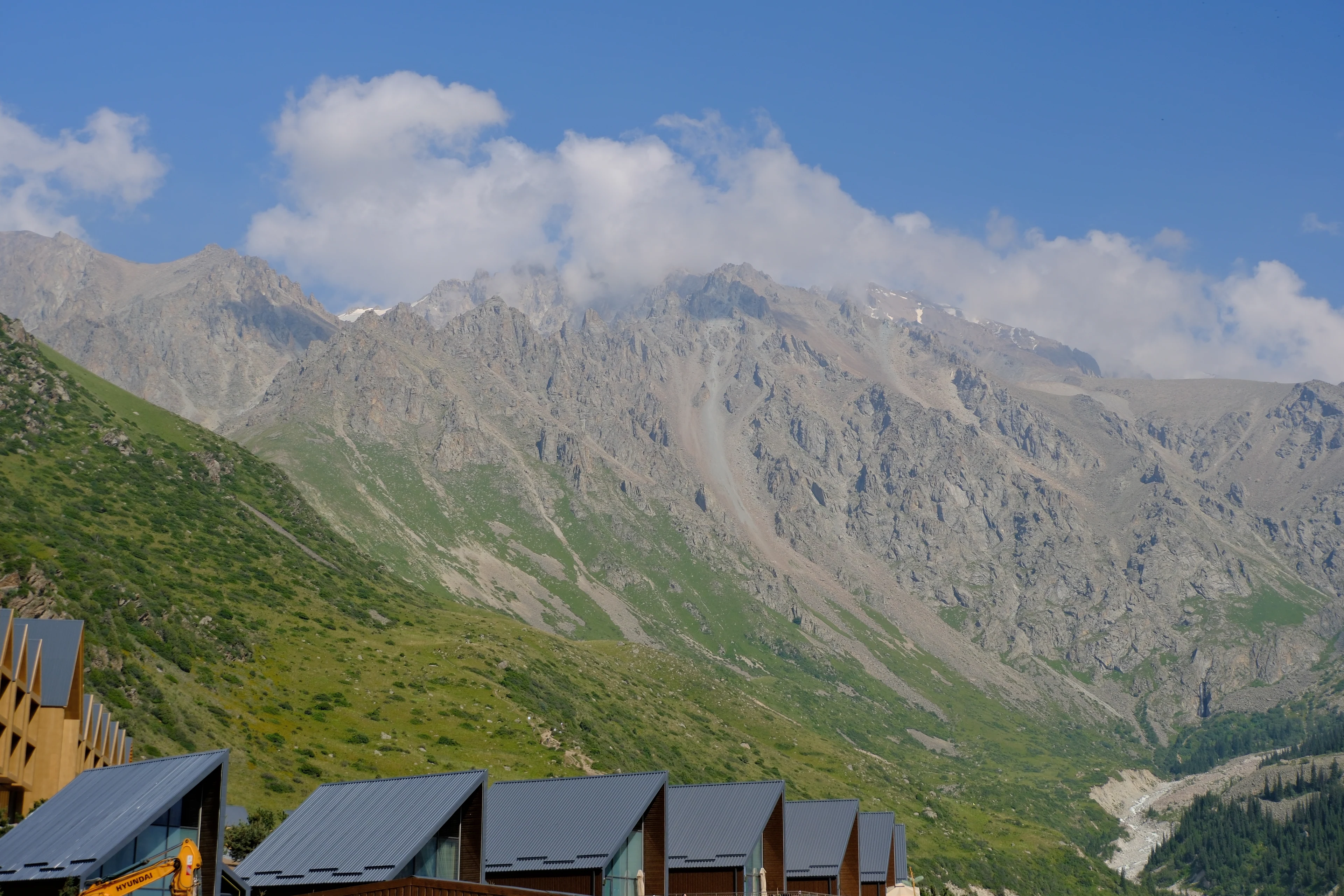 Mountain lodges beneath the rocky peaks of Ala-Archa.