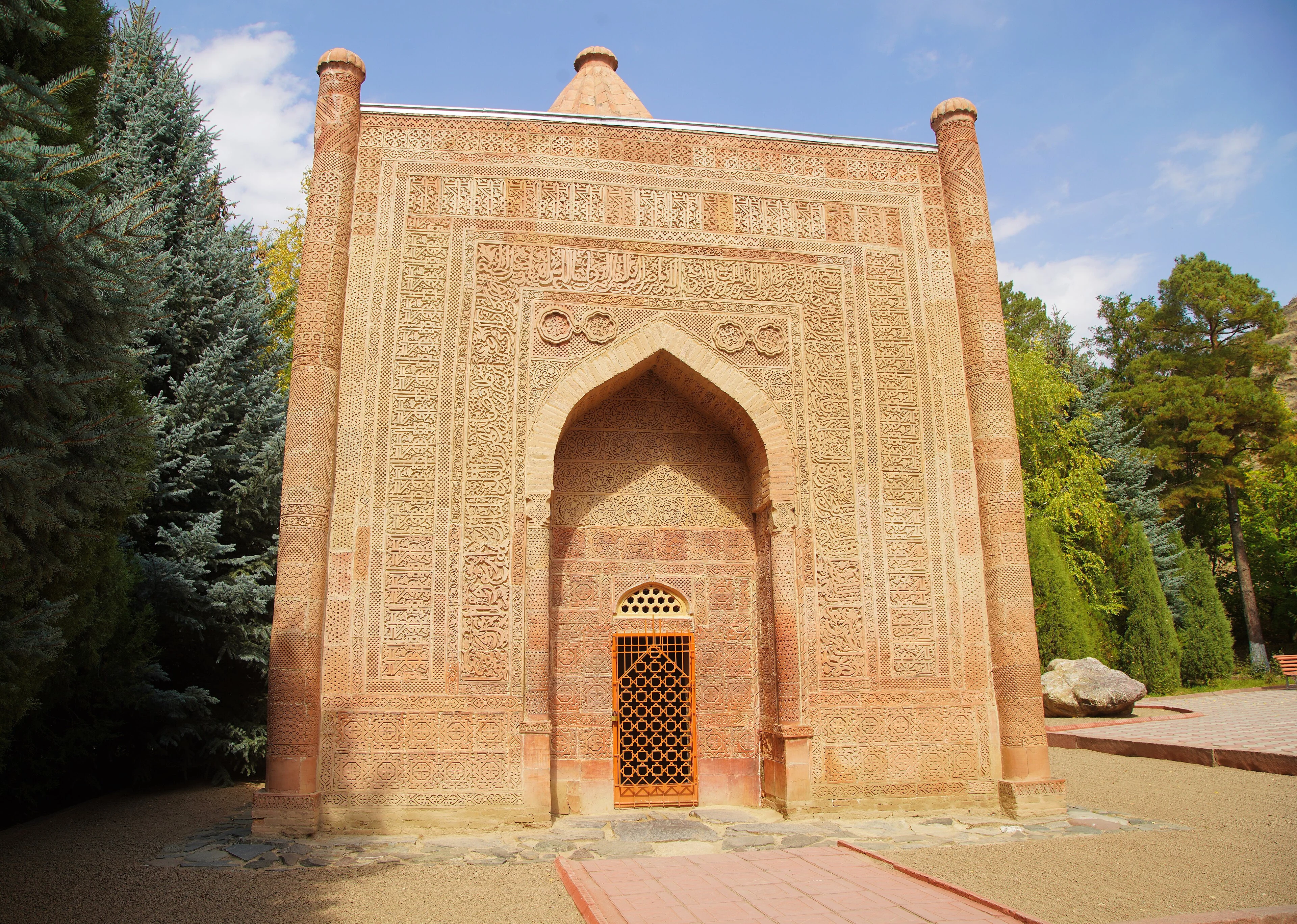 The decorated brick facade of Manas Mausoleum near Talas.